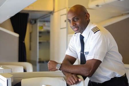 Johannesburg, South Africa - May 08 2012: British Airways Middle Aged Africam Male Captain Pilot