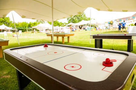Johannesburg, South Africa - November 25, 2012: Table Hockey and other games under a tent in a park for recreationのeditorial素材