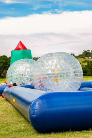 Johannesburg, South Africa - November 25, 2012: Inflatable water slides and other activities at...