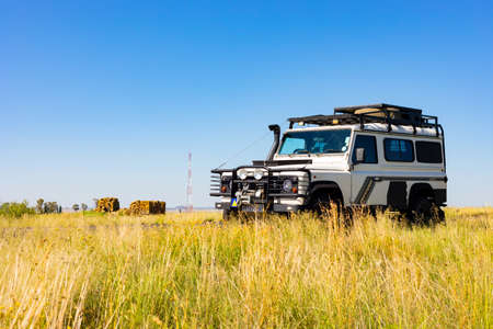 Karoo, South Africa - March 17 2019: Old Land Rover Defender parked beside a national highway in the countryside of South Africaのeditorial素材