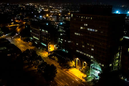 Johannesburg, South Africa - September 17, 2013: High Angle view of illuminated building and street...