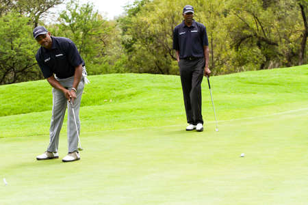 Sun City, South Africa - October 28, 2012: Amateur golfers playing a round of golf as a recreational pursuitのeditorial素材