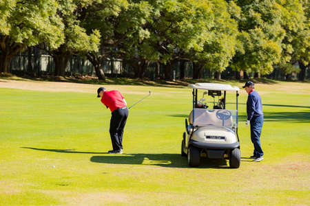 Johannesburg, South Africa - June 15, 2018: Amateur golfers playing a round of golf as a recreational pursuitのeditorial素材