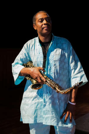 Johannesburg, South Africa - February 18, 2014: African Artist Femi Kuti, Nigeria posing for a photo with a Saxophoneのeditorial素材
