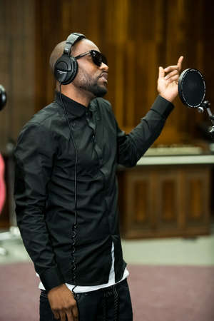 Johannesburg, South Africa - February 17, 2014: African Artist Fally Ipupa, DRC singing in a SABC recording studioのeditorial素材