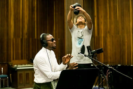 Johannesburg, South Africa - February 18, 2014: African Artist D'banj, Nigeria singing in a SABC recording studioのeditorial素材