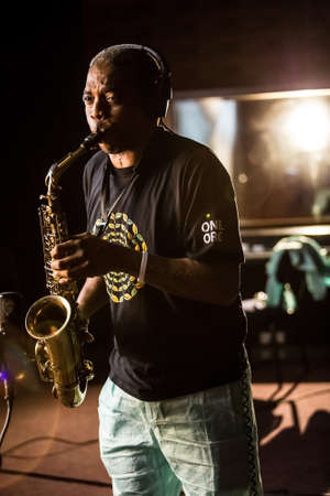 Johannesburg, South Africa - February 18, 2014: African Artist Femi Kuti, Nigeria playing saxophone in a SABC recording studioのeditorial素材