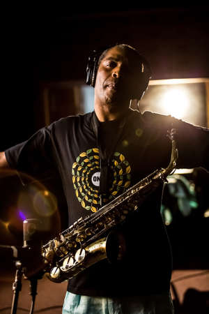 Johannesburg, South Africa - February 18, 2014: African Artist Femi Kuti, Nigeria playing saxophone in a SABC recording studioのeditorial素材