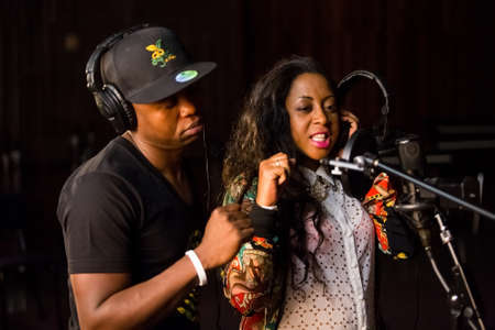 Johannesburg, South Africa - February 18, 2014: African Artists Dama Do Bling, Mozambique, Wax Dey, singing in a SABC recording studioのeditorial素材