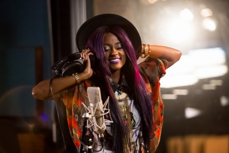 Johannesburg, South Africa - April 29, 2015: Vanessa Mdee, Tanzania singer recording vocal part on...