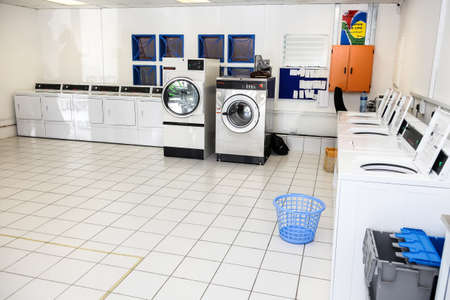 Johannesburg, South Africa - October 2, 2012: Inside Interior of washing machines in self service laundromatのeditorial素材