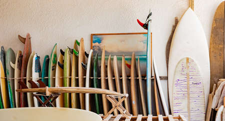 Cape Town, South Africa - March 23, 2021: Retro vintage surfboards lined up in a local surf shopのeditorial素材