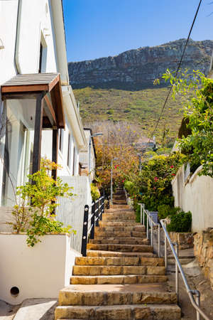 Cape Town, South Africa - March 23, 2021: Stairs for Mountainside  Houses in small coastal town of St Jamesのeditorial素材