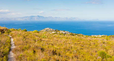 Dirt Track hiking paths on top of a mountain by the coast of Cape Town