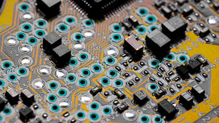 Macro Close up of printed wiring and components on PC circuit board