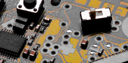 Macro Close up of printed wiring and components on PC circuit boardの写真素材