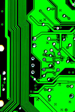 Macro Close up of printed wiring on green PC circuit board