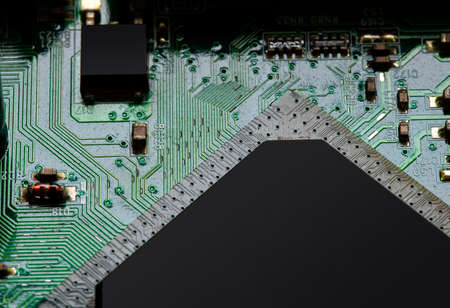 Macro Close up of components and microchips on PC circuit board.