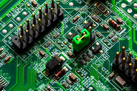 Macro Close up of components and microchips on PC circuit board.