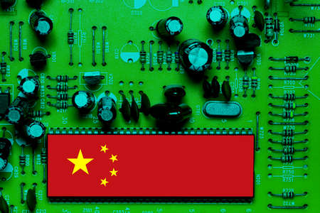 Chinese National Flag overlaid on PC micro chip on integrated circuit boardの写真素材