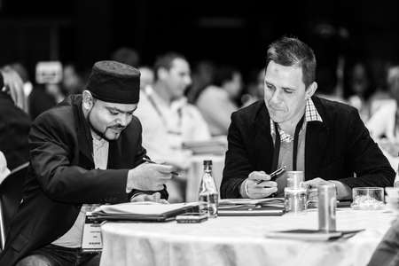 Johannesburg, South Africa - August 18, 2017: Delegates attending a sales convention in large conference hallのeditorial素材