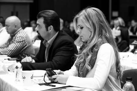 Johannesburg, South Africa - August 20, 2015: Delegates attending a sales convention in large conference hallのeditorial素材