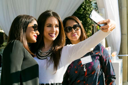 Johannesburg, South Africa - August 18, 2016: Ladies networking at woman's team-building luncheon in garden cafeのeditorial素材