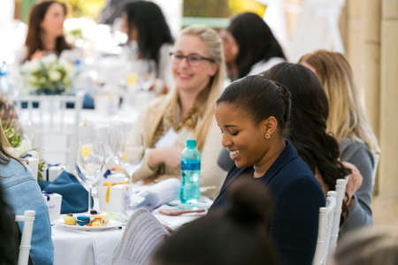 Johannesburg, South Africa - August 18, 2016: Ladies networking at woman's team-building luncheon in garden cafeのeditorial素材