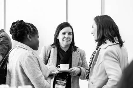Johannesburg, South Africa - August 17, 2017: Delegates networking at a sales convention in large conference hallのeditorial素材