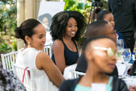 Johannesburg, South Africa - August 18, 2016: Ladies networking at woman's team-building luncheon in garden cafeのeditorial素材