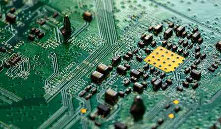Macro Close up of printed wiring on PC circuit board of modem routerの写真素材