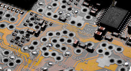 Macro Close up of printed wiring and components on PC circuit board