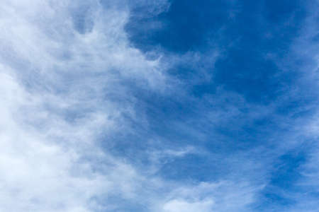 Cirrus and Stratus clouds in dramatic blue sky over Cape Town South Africa