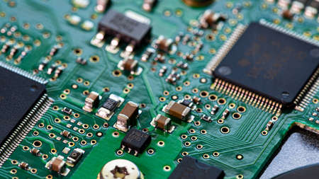 Macro Close up of components and microchips on PC circuit board of Hard Disc Drive