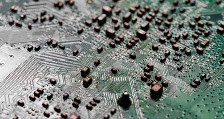 Macro Close up of printed wiring on PC circuit board of modem routerの写真素材
