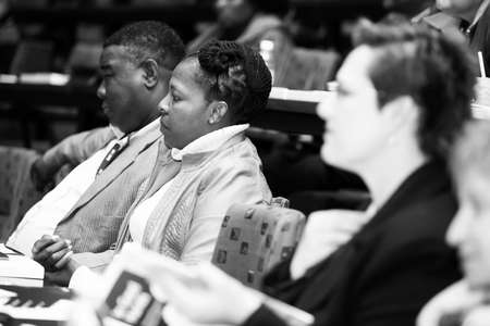Johannesburg, South Africa - June 26, 2015: Delegates attending a AGM meeting in auditorium hallのeditorial素材