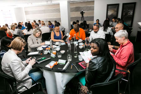 Johannesburg, South Africa - November 19, 2014: Diverse students attending a networking and...