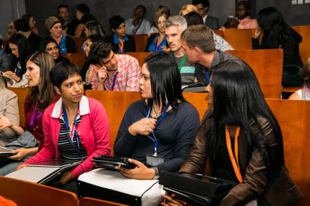 Johannesburg, South Africa - November 19, 2014: Diverse students attending a networking and...