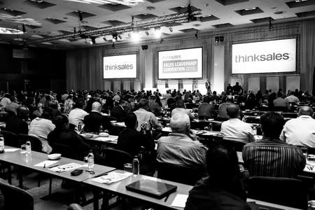Johannesburg, South Africa - August 20, 2015: Delegates attending a sales convention in large conference hallのeditorial素材