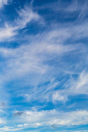 Cirrus and Stratus clouds in dramatic blue sky over Cape Town South Africaの写真素材