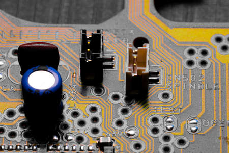 Macro Close up of printed wiring and components on PC circuit board