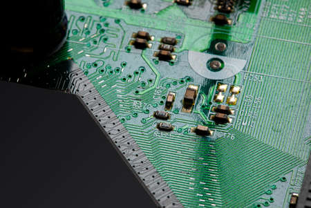 Macro Close up of components and microchips on PC circuit board.