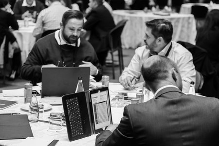 Johannesburg, South Africa - August 18, 2017: Delegates attending a sales convention in large conference hallのeditorial素材