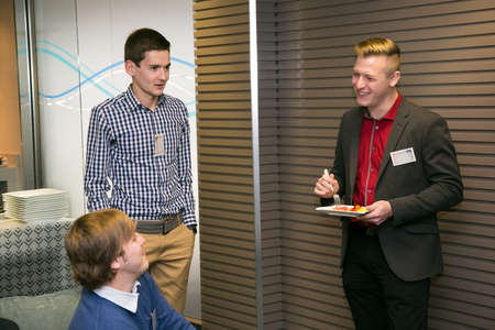 Johannesburg, South Africa - June 10, 2015: Young college students networking