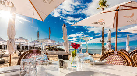 Cape Town, South Africa - May 12, 2022: Table setting at Grand Africa Cafe and Beach bar restaurantのeditorial素材