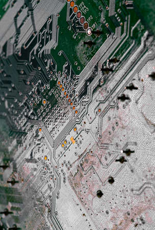 Macro Close up of printed wiring on PC circuit board of modem routerの写真素材