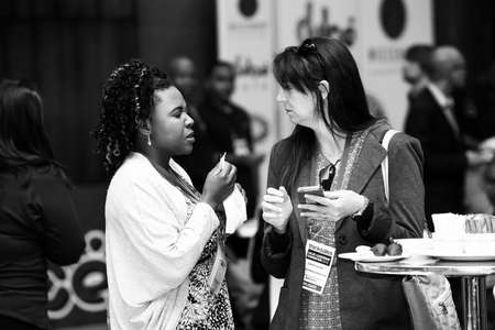 Johannesburg, South Africa - August 20, 2015: Delegates networking at a sales convention in large...
