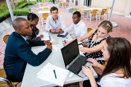 Johannesburg, South Africa - February 24, 2014: Diverse College students attending a business...