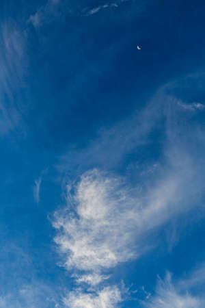 Cirrus and Stratus clouds in dramatic blue sky over Cape Town South Africaの写真素材