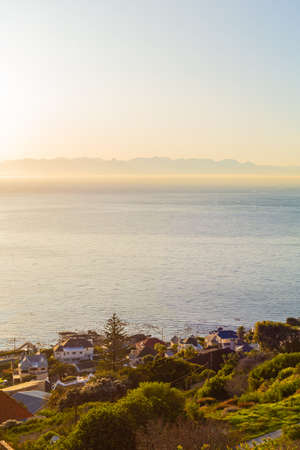 Fish Hoek residential neighborhood viewed from the top of local mountain rangeの写真素材